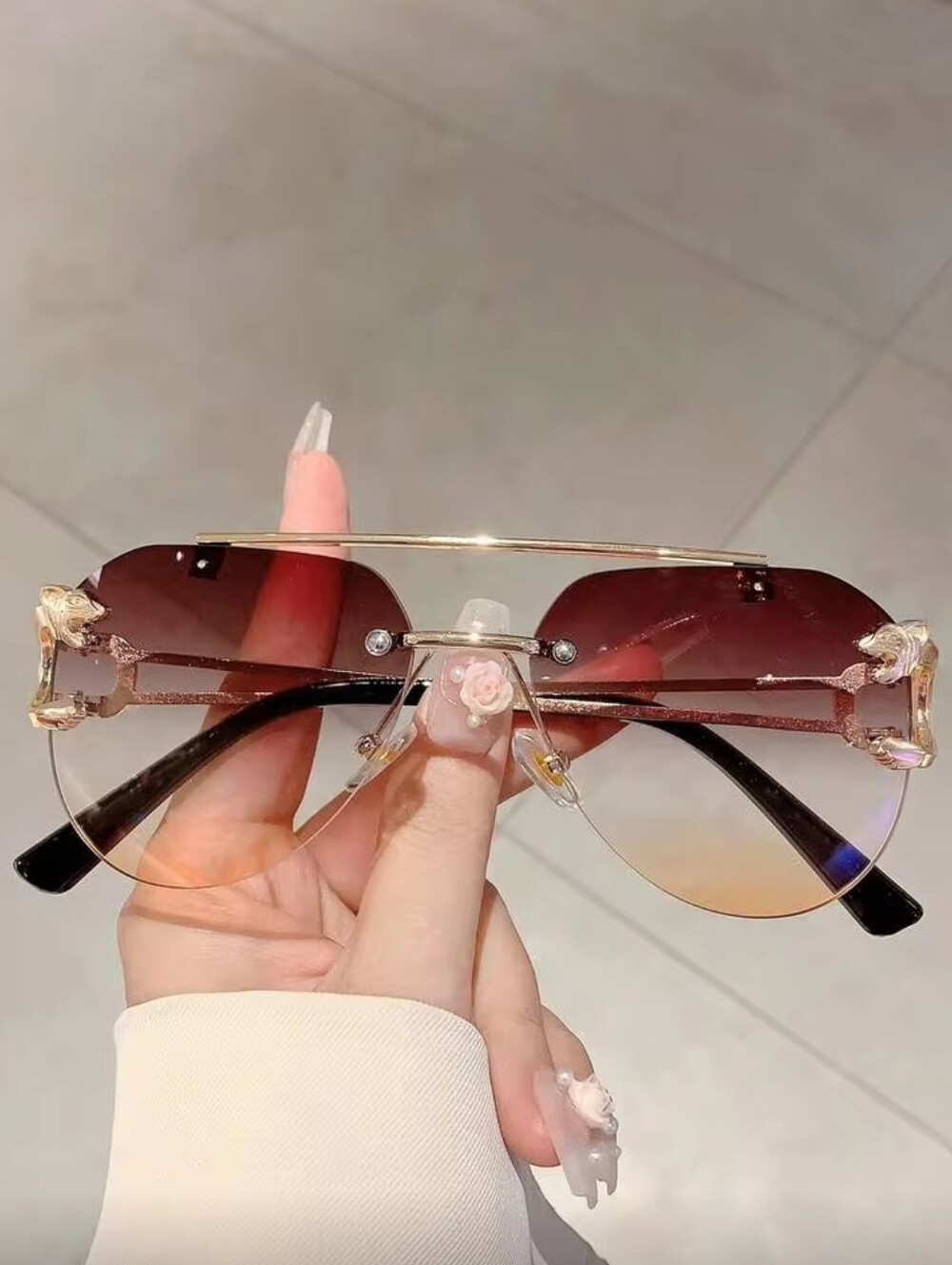 Women's Rimless Gradient Red and Yellow Sunglasses with Gold Accents